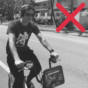 Stay alert. Do not ride with headphones or earbuds.