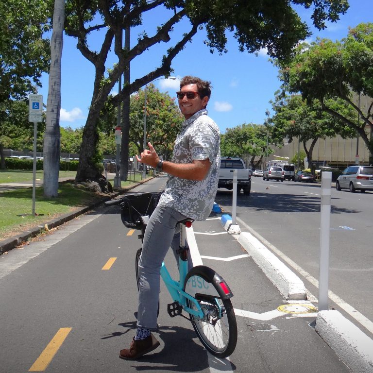 Rider on the King Street Protected Bike Lane.